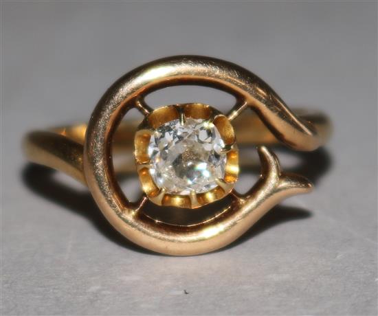 A gold and solitaire diamond ring, size M.